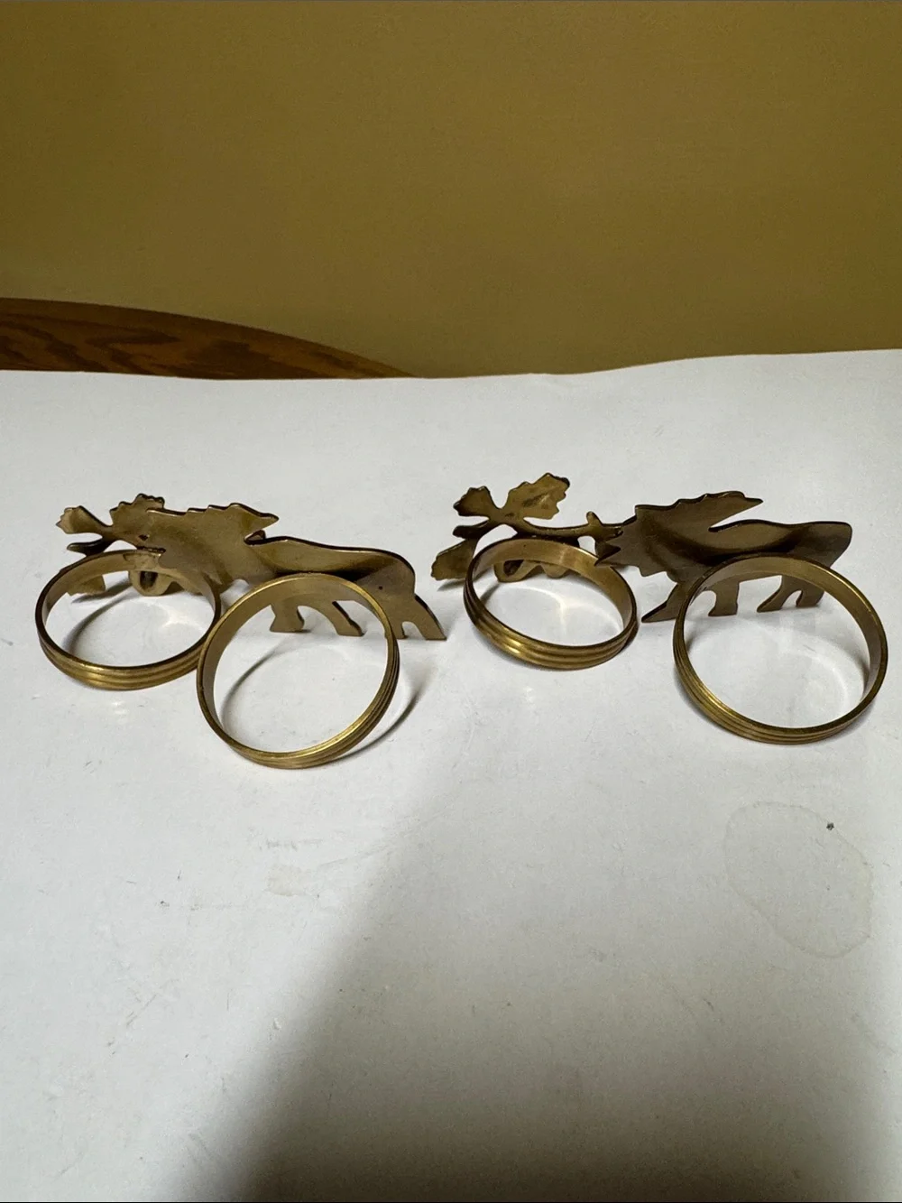 brass moose and pinecone and branch napkin rings set of 4